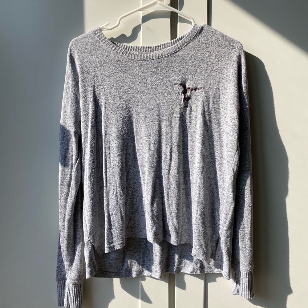 Light Gray flowy top with embroidered gymnast
